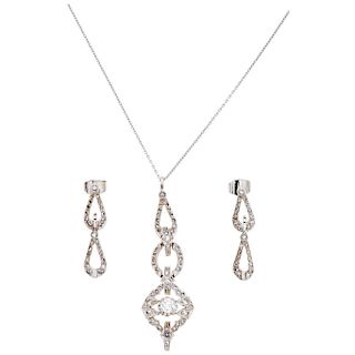 A diamond 14K white gold choker, pendant and pair of earrings set. 