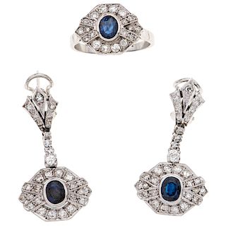 A sapphire and diamond palladium silver ring and pair of earrings set. 