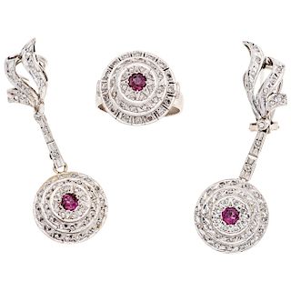 A ruby and diamond palladium silver ring and pair of earrings set.  