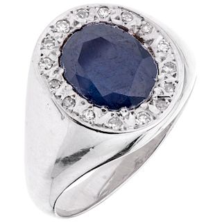 A sapphire and diamond 14K white gold ring. 