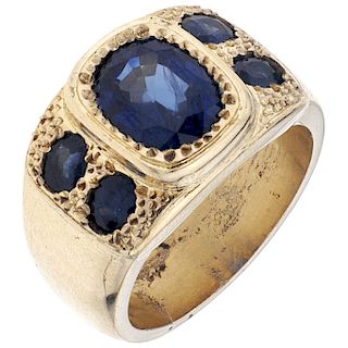 A sapphire 14K yellow gold ring. 
