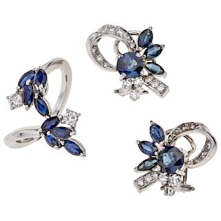 A sapphire and diamond 18K white and palladium silver ring and pair of earrings. 