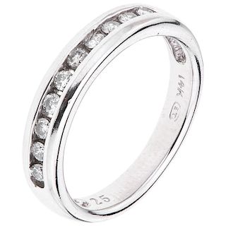 A diamond 14K white gold half eternity ring. 