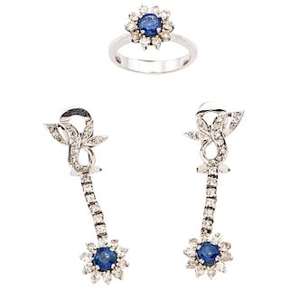 A sapphire and diamond 14K white gold ring and pair of earrings set. 