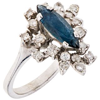 A sapphire and diamond 18K white gold ring. 