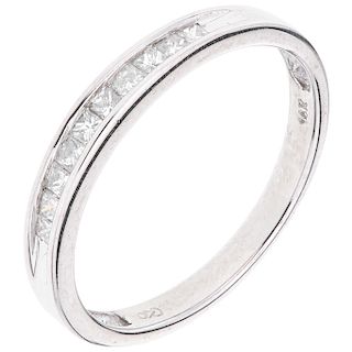 A diamond 14K white gold half eternity ring. 