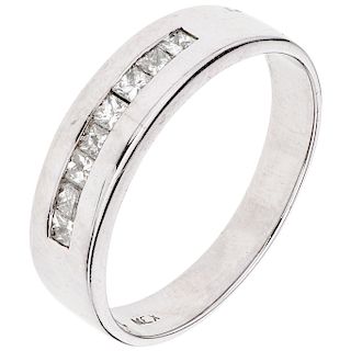 A diamond 14K white half eternity ring. 