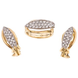 A diamond 14K yellow gold ring and pair of earrings set. 