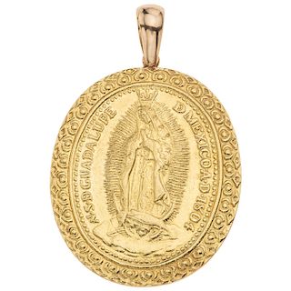 A 14K yellow gold medal. 