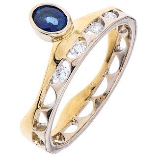 A sapphire and diamond 18K yellow gold ring. 