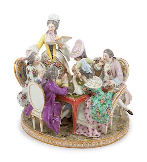 A Continental Porcelain Figural Group
Height 11 x width 11 inches.