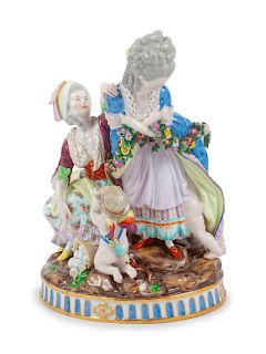 A Meissen Porcelain Figural Group
Height 9 x width 7 1/2 inches.