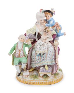 A Meissen Porcelain Figural Group
Height 9 1/2 inches.