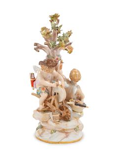 A Meissen Porcelain Figural Group
Height 8 1/4 inches.