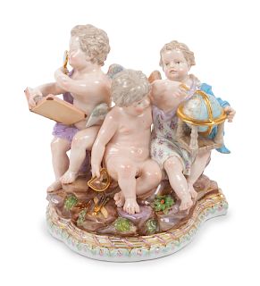A Meissen Porcelain Figural Group
Height 8 inches.