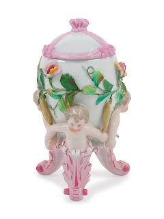 A KPM Porcelain Lidded Figural Vase
Height 7 1/2 inches.