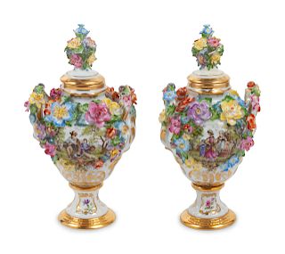 A Pair of Lidded Porcelain Vases
Height 8 3/4 inches.