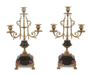 A Pair of Continental Marble and Brass Three-Light Candelabra
Height 9 inches.