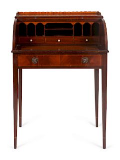 An English Mahogany Roll-Top Writing Desk
Height 38 1/2 x width 27 1/2 x depth 20 inches.