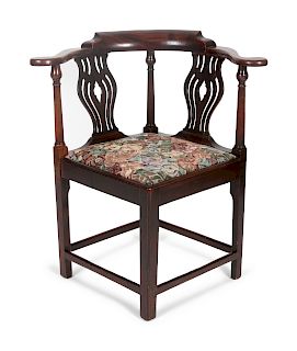 A Chippendale Mahogany Corner Chair
Height 32 x width 22 1/2 x depth 22 1/2 inches.