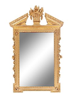 An English Chippendale Carved Giltwood Mirror
Height 53 x width 33 inches.