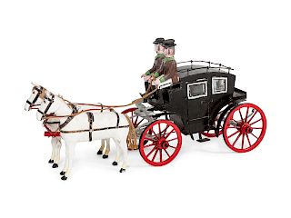 A Folk Art Carved and Painted Wood Two-Horse Carriage and Riders
Length 40 inches.