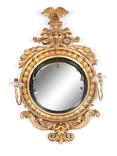 An American Federal Convex Giltwood Mirror
Height 40 x width 27 inches.