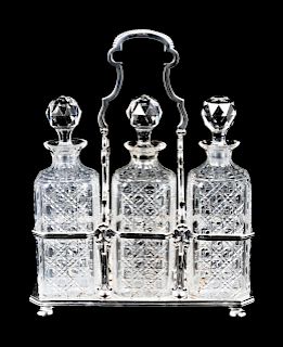 A Silver-Plate Decanter Set
Height 15 inches.