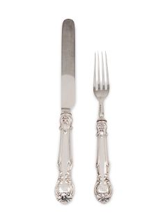 An English Silver Fruit Set for Twelve
Henry John Lias, London, 1857-58
comprising:12 forks13 knives with stainless steel blades25 items total.