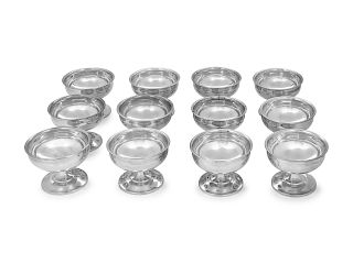 A Set of Twelve American Silver Dessert Cups
Reed & Barton, Taunton, MA
each with rolled lip.