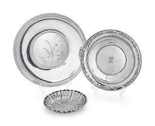 Three American Silver Articles
Gorham Mfg. Co., Providence, RI
comprising a round platter and two shallow dishes.