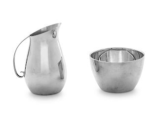 An American Silver Creamer and Sugar Set
Lunt Silversmiths, Greenfield, MA, 20th century
of modern form.