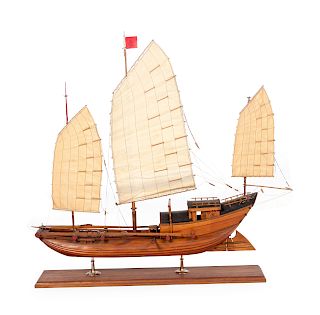 A Model of a Chinese River Junk
Height 29 x length of base 28 inches.