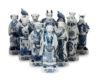 A Group of Thirteen Chinese Animal Figures
Height of tallest 11 inches.