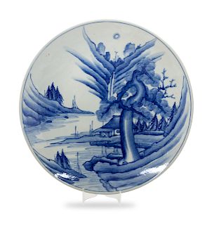 A Japanese Blue and White Porcelain Plate
Diameter 18 3/8 inches.