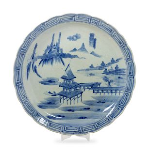 A Japanese Blue and White Porcelain Plate
Diameter 17 3/4 inches.