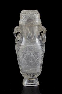 An Archaistic Carved Rock Crystal Lidded Vase.