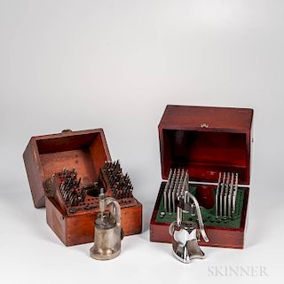 Two Cased Watchmaker's Staking Sets