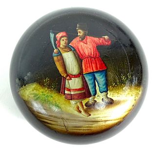 A Russian Lacquer Round Snuffbox "A peasant Couple