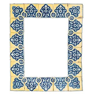 FRAME. MEXICO, 19th CENTURY. Talavera mosaics, white and blue decoration over yellow, with floral motifs. 5 x 5 in