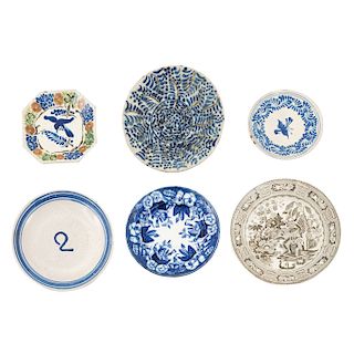 SET OF PLATES. MEXICO, CIRCA 1900. Talavera and polychromed half porcelain. Decorated with vegetal and animal motifs.