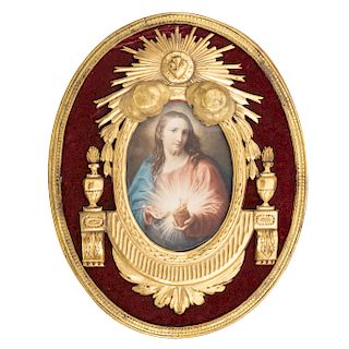 BRONZED FRAME WITH IMAGE OF THE SACRED HEART OF JESÚS. MEXICO, 20TH CENTURY. Wooden and bronze framework with red velvet details. 4.5 x 7 in