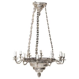 VOTIVE LAMP (ADAPTATION). MEXICO, 19TH CENTURY. Silver metal, chiselled with vegetal motifs. 48.8 in