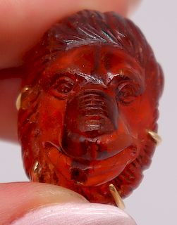 JEWELRY. Carved Amber? Lion Pendant.