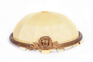 A Louis XVI Style Gilt Metal and Silk Bed Crown
Height 14 x width 28 1/2 x depth 26 inches.