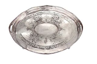 An English Silver Plate Oval Serving Tray
Height 3 1/2 x width 26 1/4 x depth 18 3/4 inches.