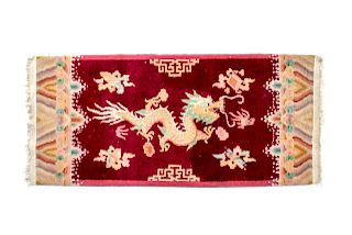 A Chinese Wool Rug
57 1/2 x 27 inches.