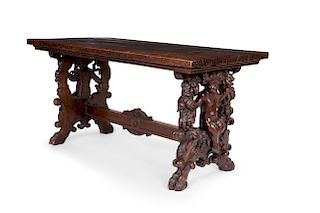 Spanish Baroque style carved walnut library table