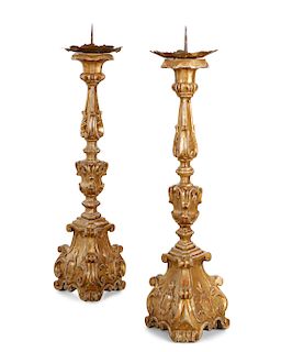 A pair of Continental Baroque giltwood prickets