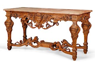 A Louis XIV style carved oak side table
